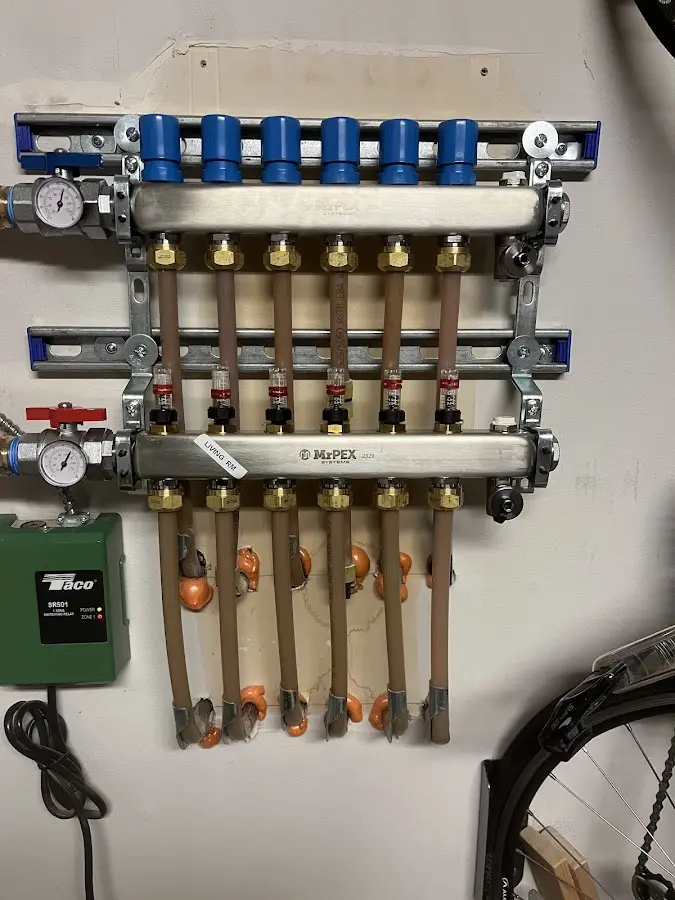 Plumber performing Water Heater Repair at a residential property in Lake Ridge